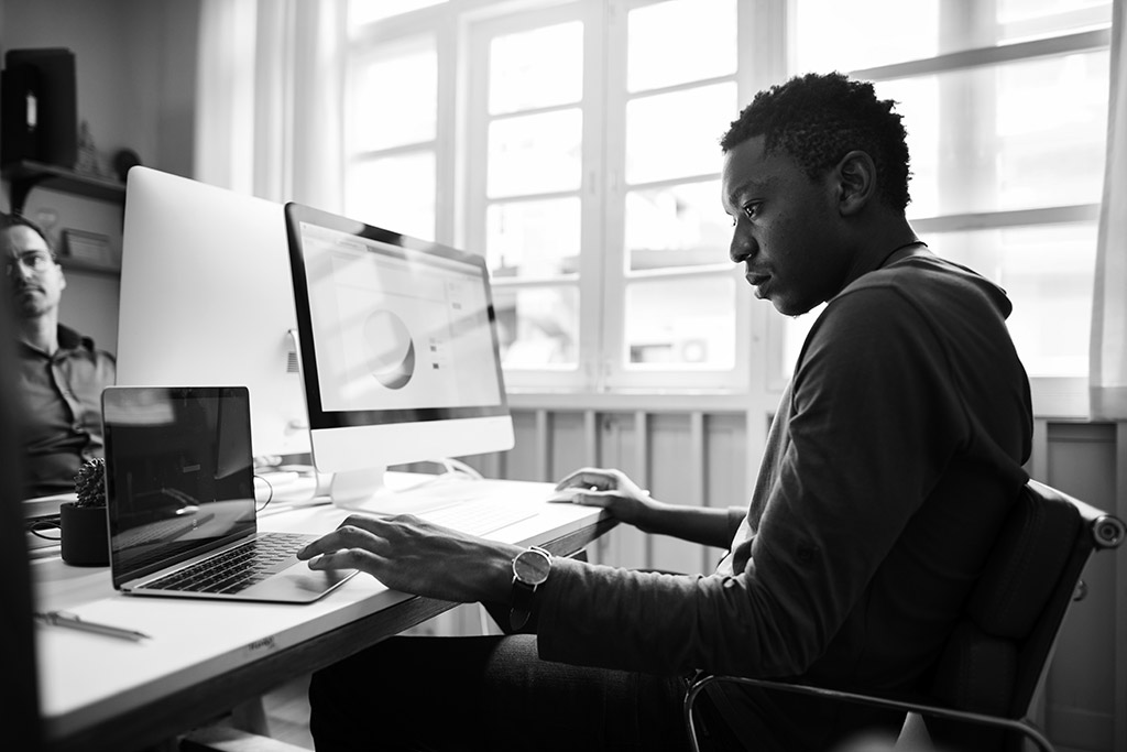 casual-african-american-businessman-working-in-off-2022-12-15-23-49-20-utc