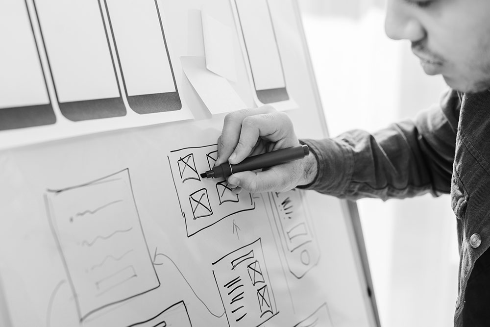 cropped-view-of-designer-with-marker-creative-ux-d-2022-12-16-19-32-55-utc